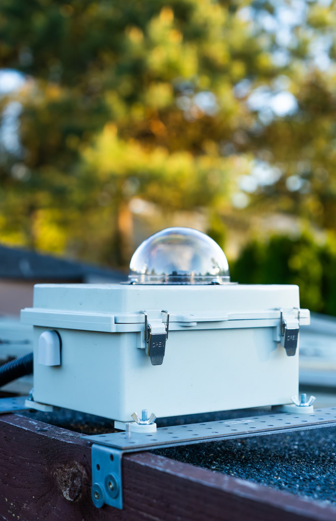 The physical allsky camera enclosure mounted outdoors at dusk